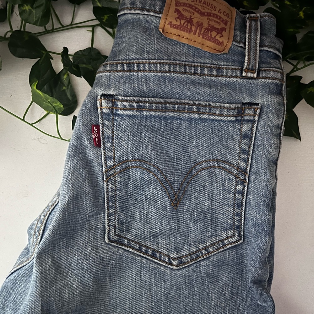 Brand is Levi, Light washed shorts, Size 26.